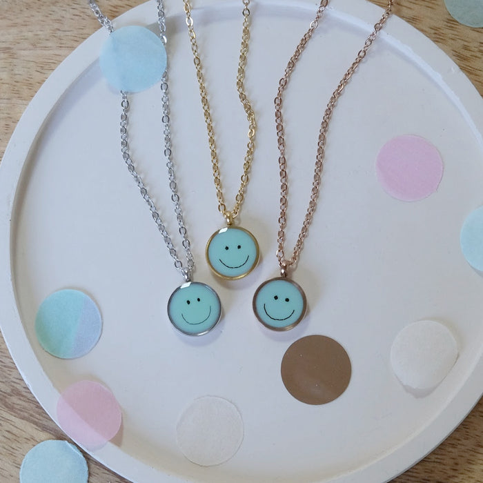 LITTLE ETERNAL SMILEY – Haarkette pastellblau