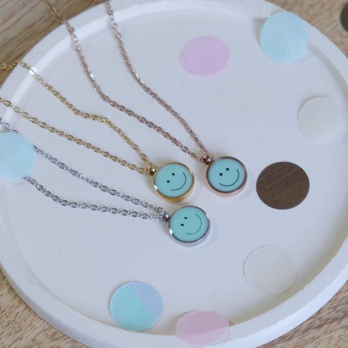 LITTLE ETERNAL SMILEY – Haarkette pastellblau